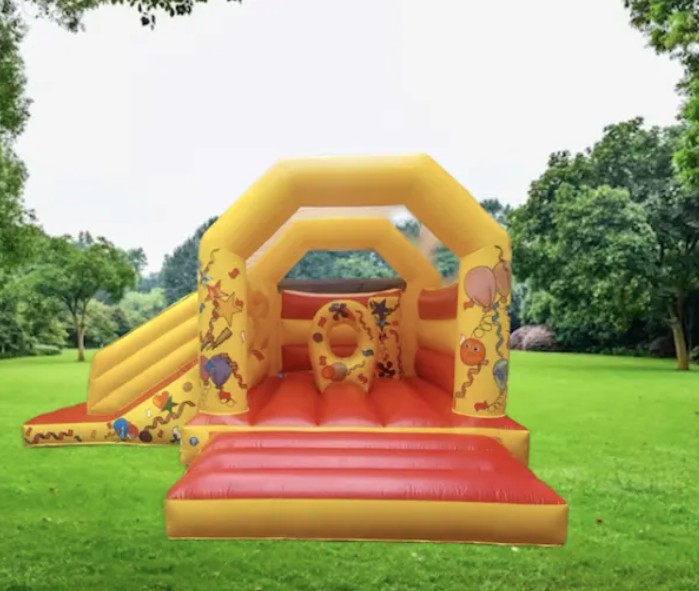 Colorful yellow and red inflatable with slide set up outdoors on a green lawn, provided by Bizi Bouncers UK for Bouncy Castle Hire Wanstead.